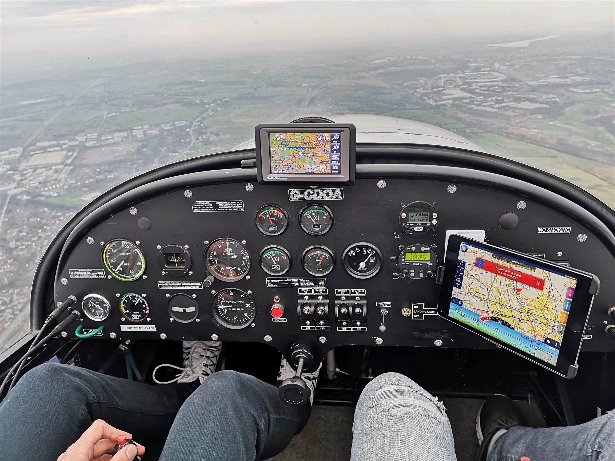 Cockpit panel with GPS and moving map in flight